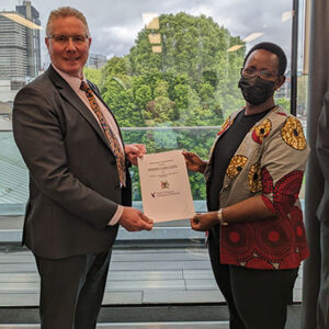 Gordon Miles (RCEM CEO) and Dr Diane Atwine (PS of Health for Uganda MOH) pictured after signing MOU between RCEM & the Ugandan MOH.