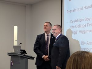 Dr Adrian Boyle (left) handing over the RCEM presidential chain to Dr Ian Higginson (right) during the College's AGM on 11 September.