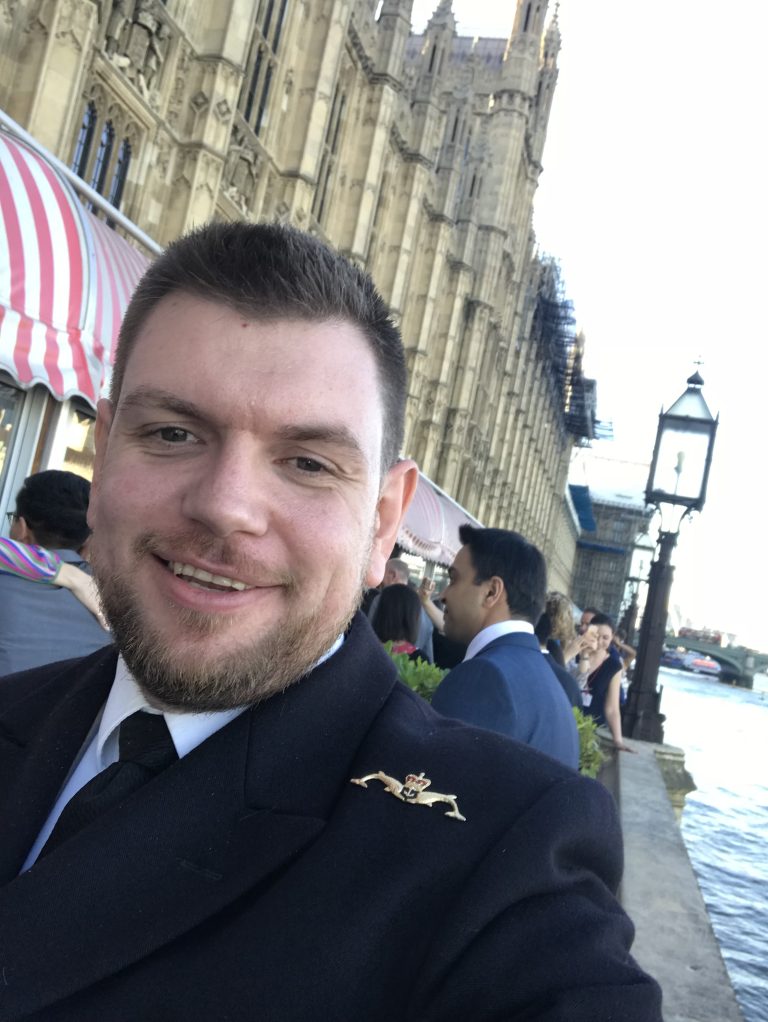 Mike Hill in a navy uniform at an event